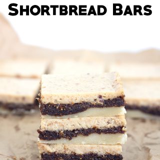Fig cheesecake shortbread bars are stacked.